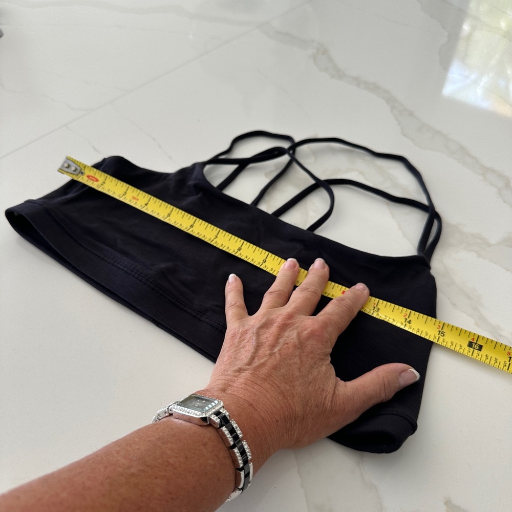 Black yoga sports bra size large across it measures 30